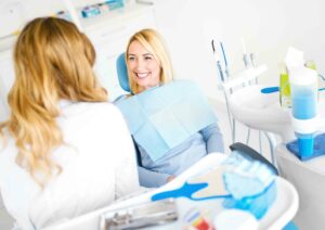 Female Dental Patient Smiling after Teeth Whitening