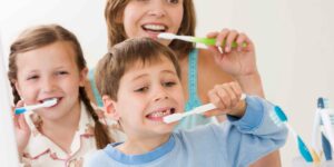 Kids Using Toothbrushes - Wall Street Dental Spa NYC